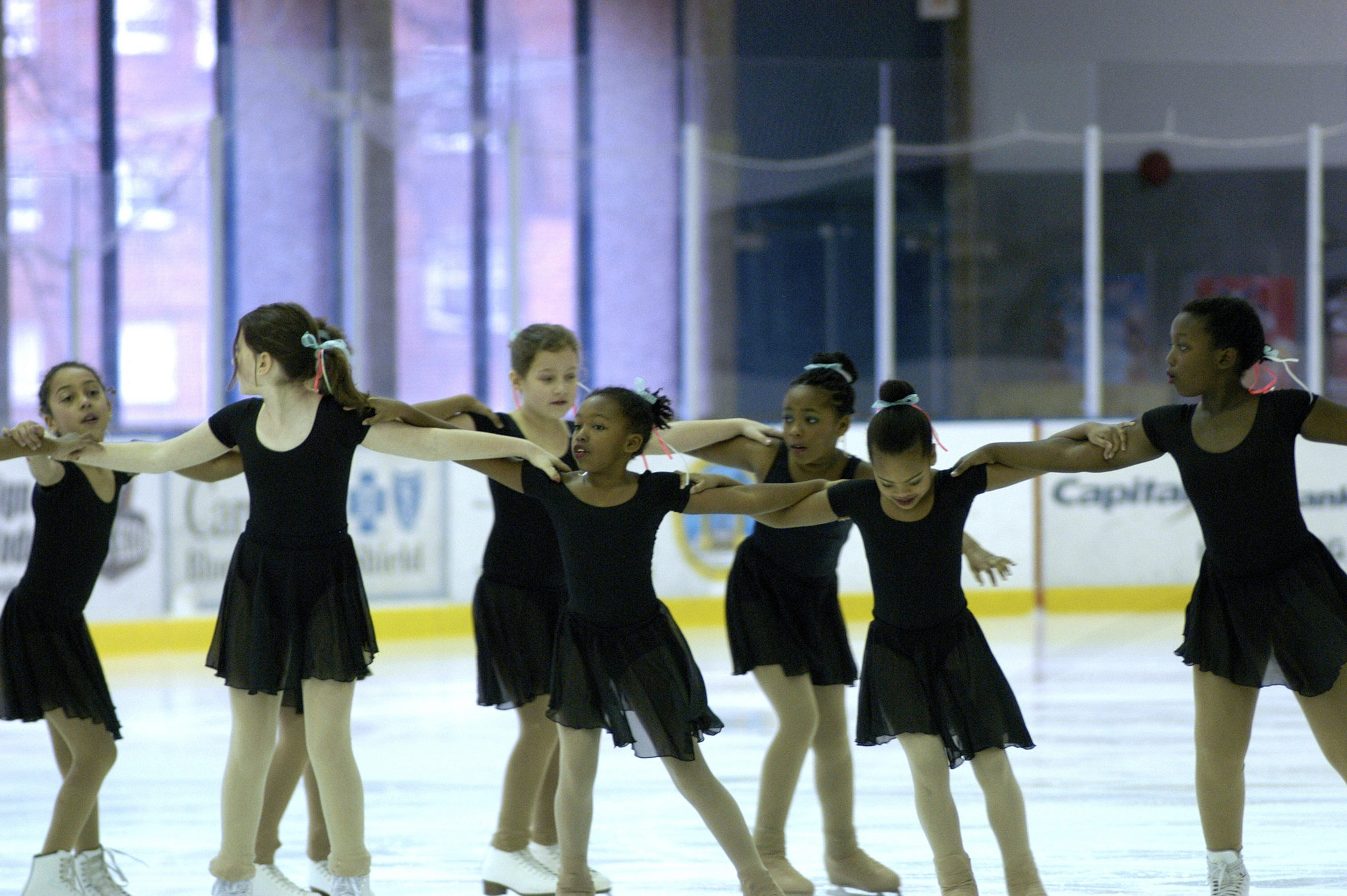 Beginner 2 Synchro Synchronized Skating Participants on the ice